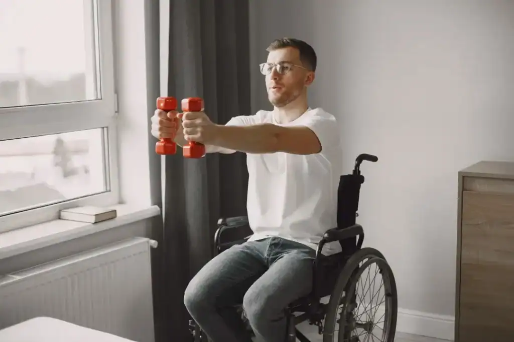 Empowering Weight Loss: A Comprehensive Guide for Individuals with Disabilities 1 Image of man doing exercise in his wheelchair to aid weight loss West Sussex