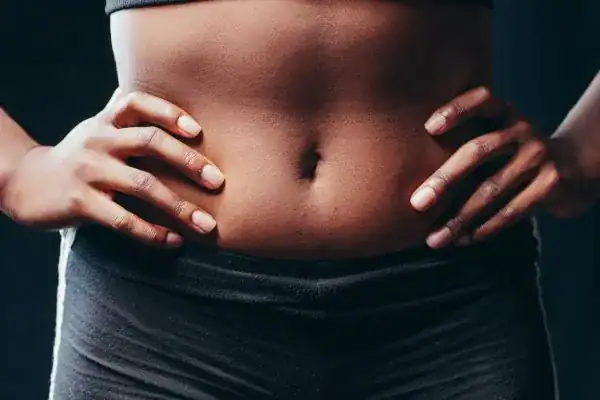 Toning Your Stomach: The Ultimate Guide to Achieving a Sculpted Stomach While Shedding Pounds 1 Image of a toned stomach after non surgical treatment West Sussex